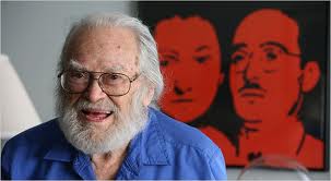 Morton Sobell at 91, 2008.  Image of the Rosenbergs behind him.