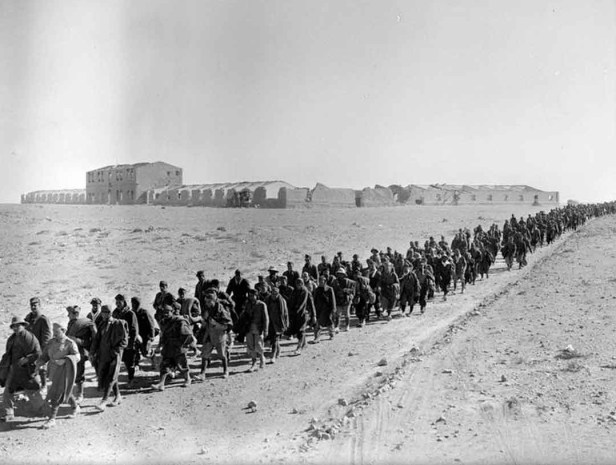 Italian prisoners captured at Sidi Barrani are marched into captivity.